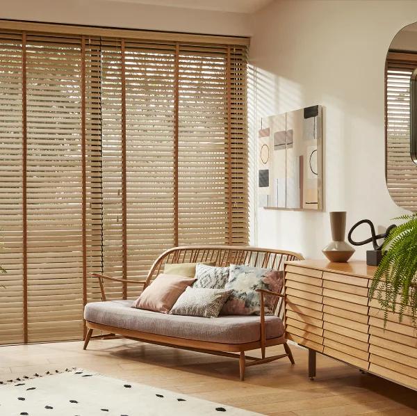 Home Wooden venetian blinds in a Dubai living room